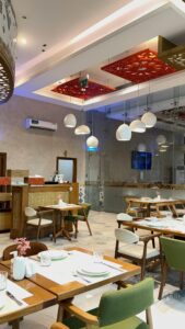 Chic restaurant interior featuring elegant design and contemporary furniture, perfect for dining.